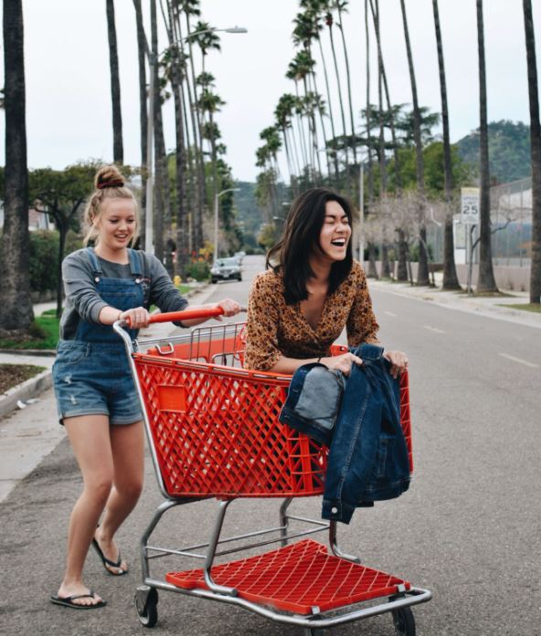 Students enjoying student shopping privileges as part of college life.