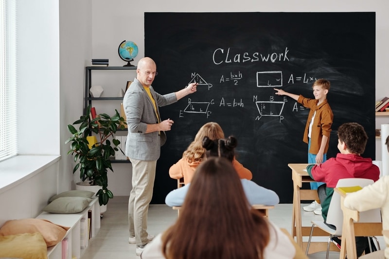 Teacher teaching students